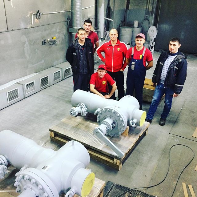AMC workers and cooling valve| photo